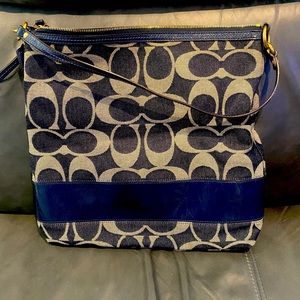 Coach tote shoulder bag.  Has never been worn, kept in dust bag.